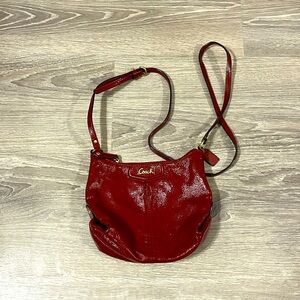Red crossbody Coach purse